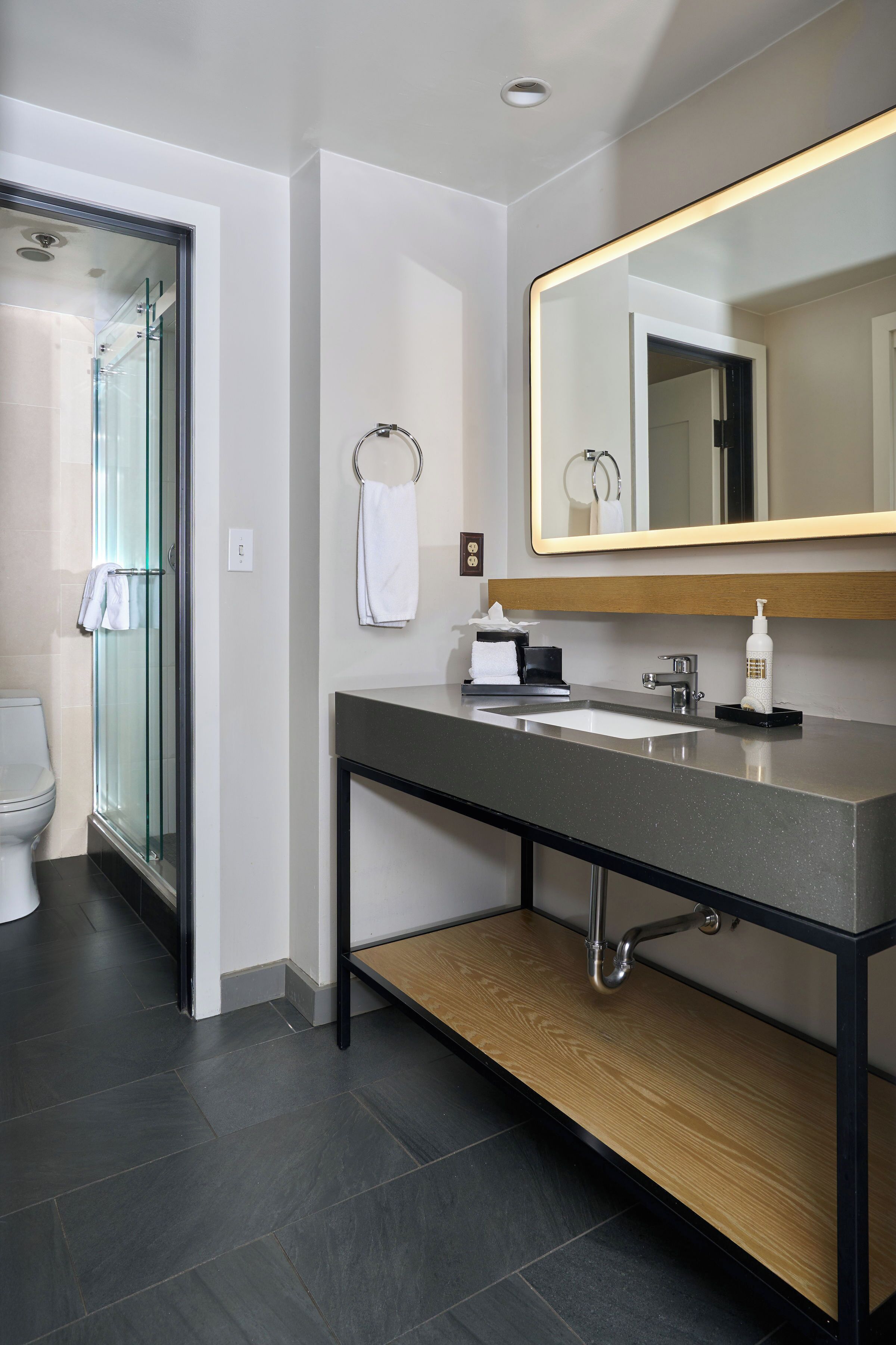 studio suite | bathroom | designer toiletries, hair dryer, bathrobes, slippers