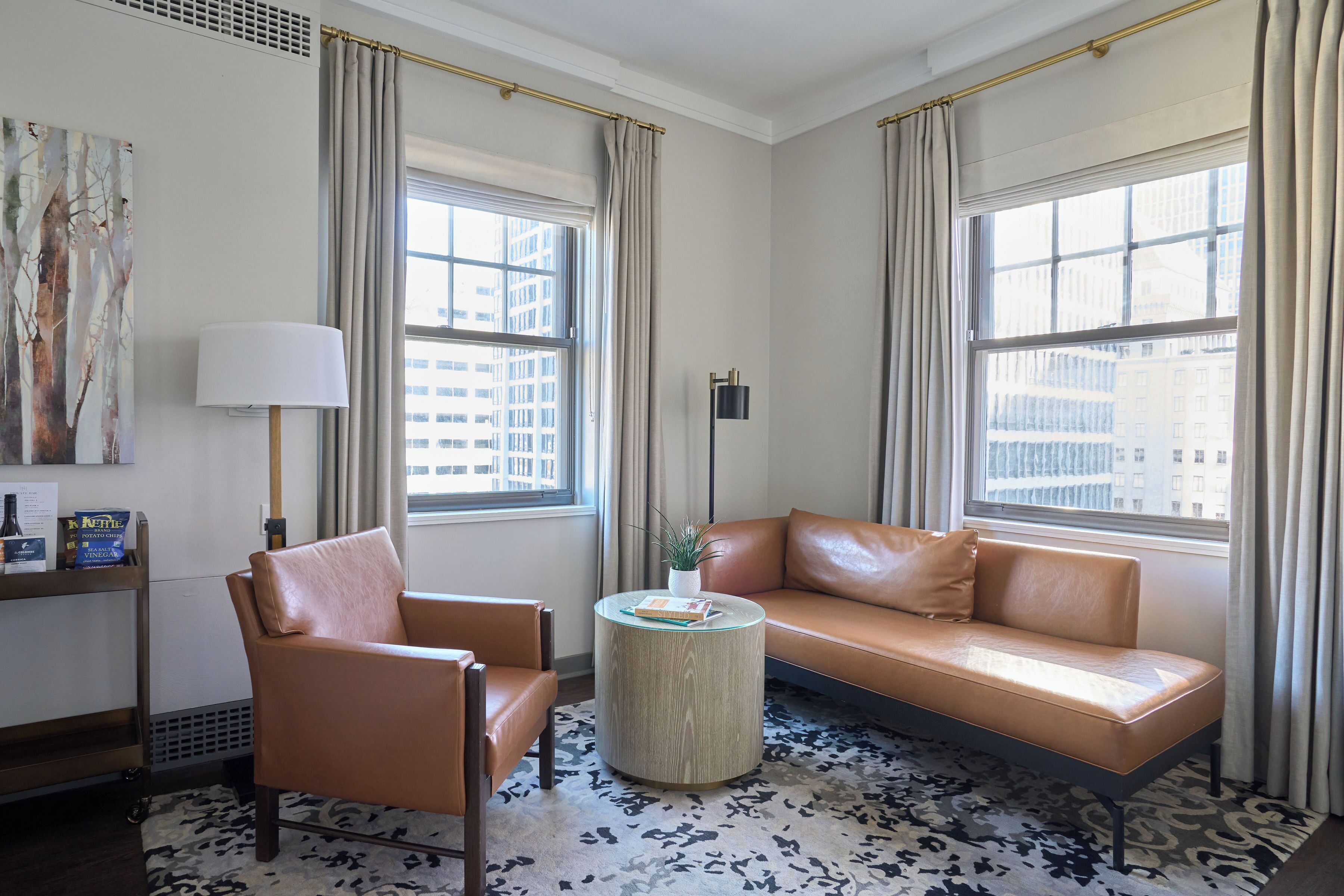 deluxe corner king | living area | 65-inch lcd tv with digital channels, tv