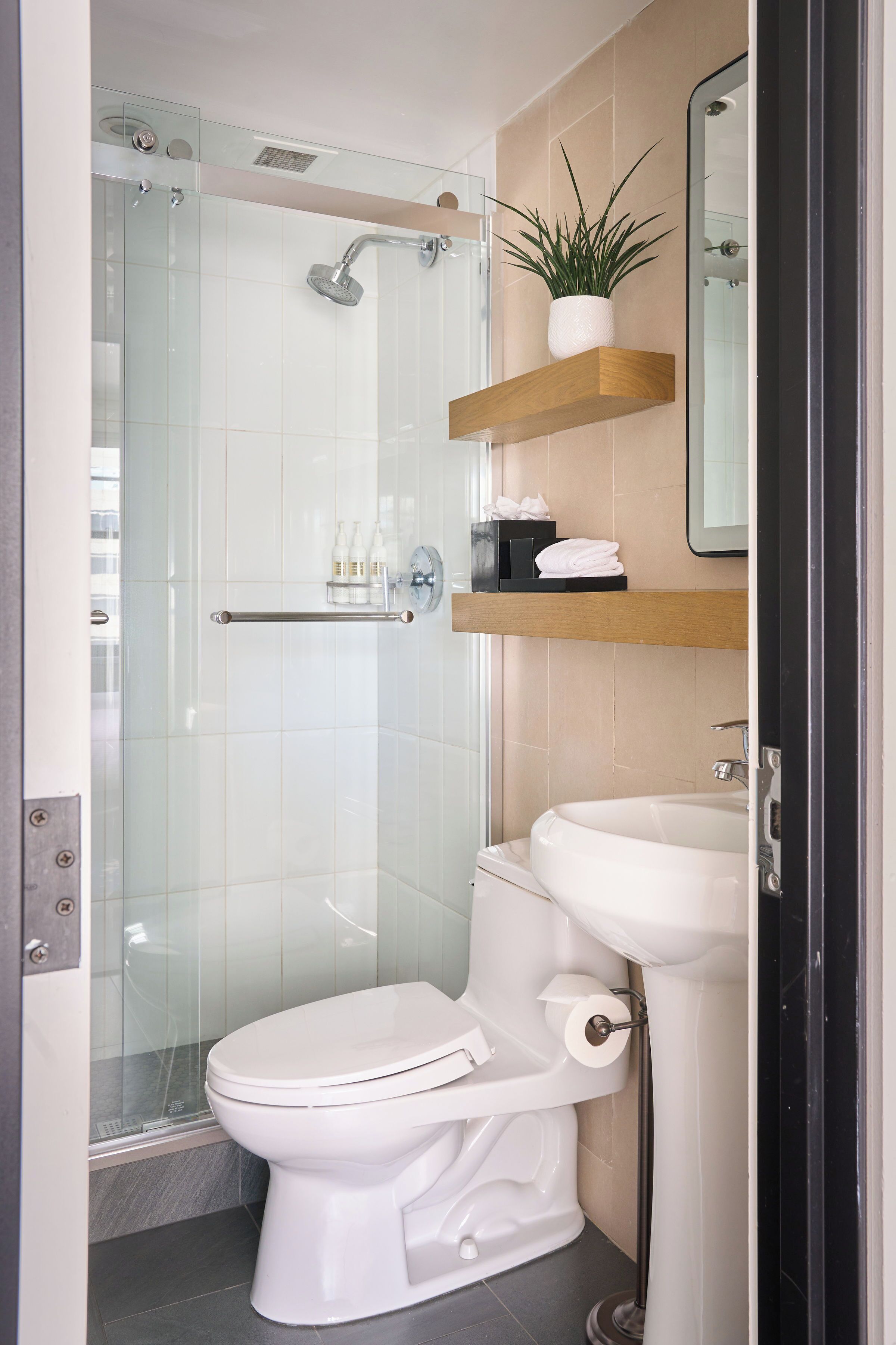 designer toiletries, hair dryer, bathrobes, slippers