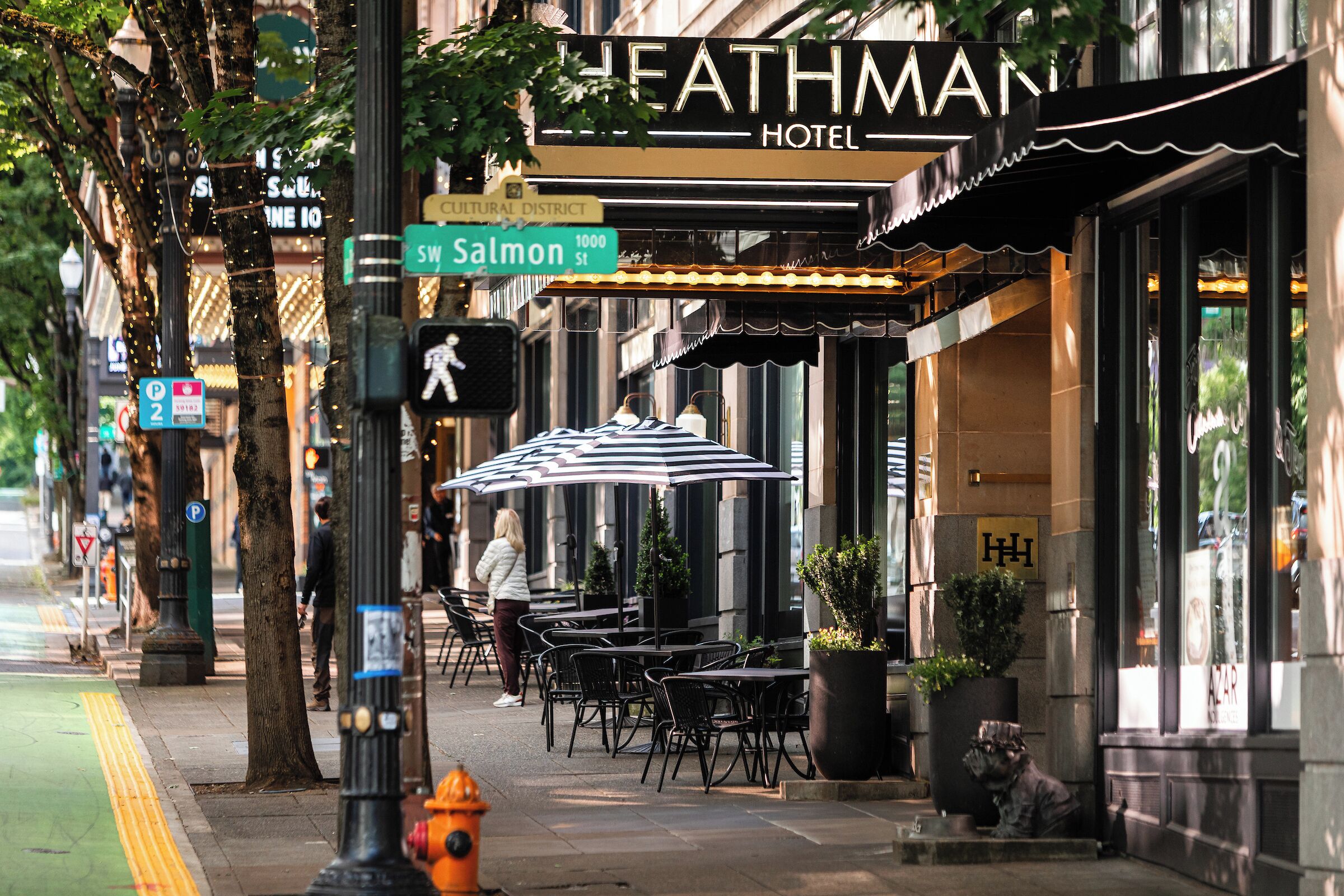 A street view with a hotel named 'HEATHMAN HOTEL' and a street sign for 'SW Salmon St.'