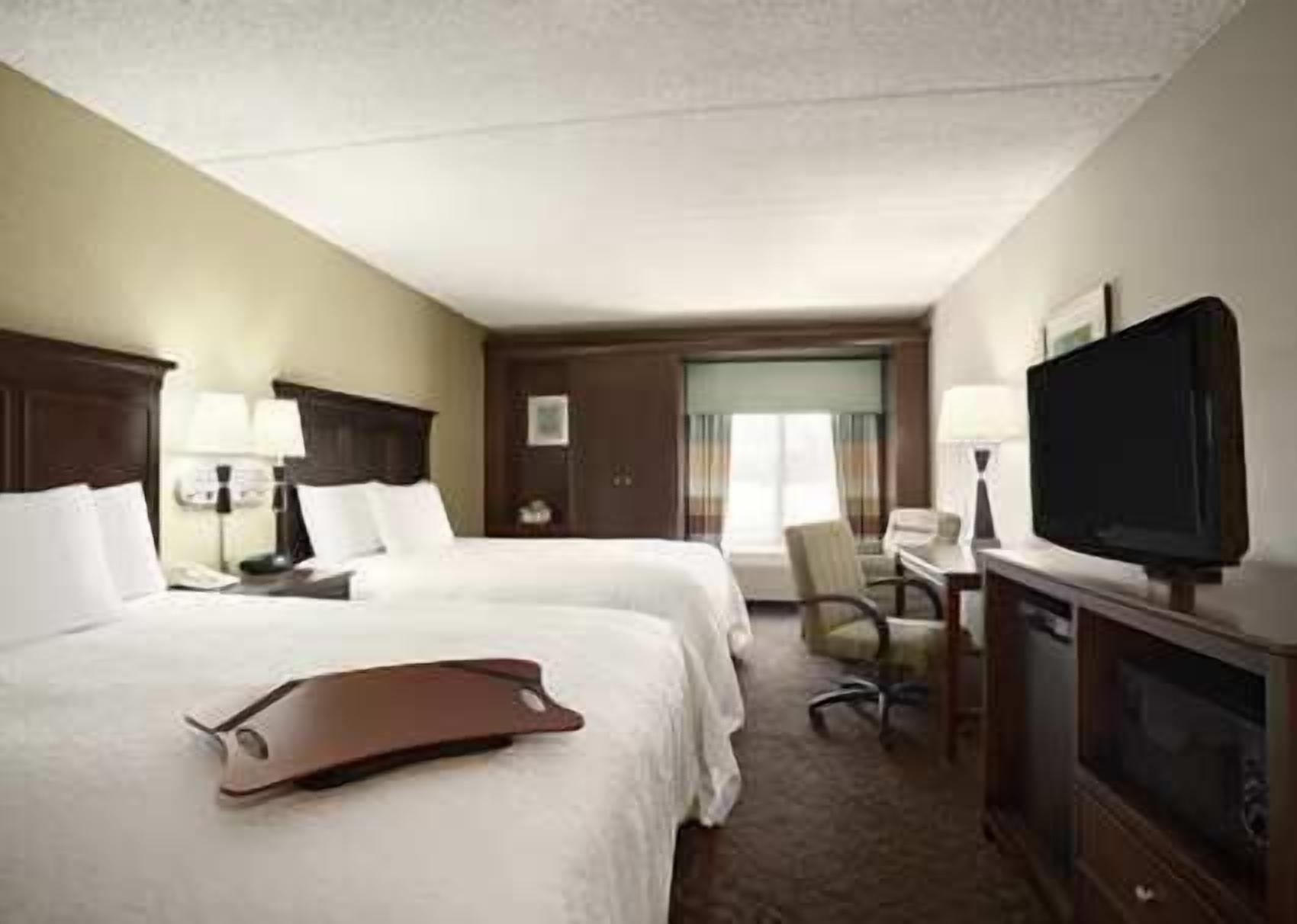 room, 2 double beds, non smoking | in-room safe, desk, iron/ironing board, cots/infant beds