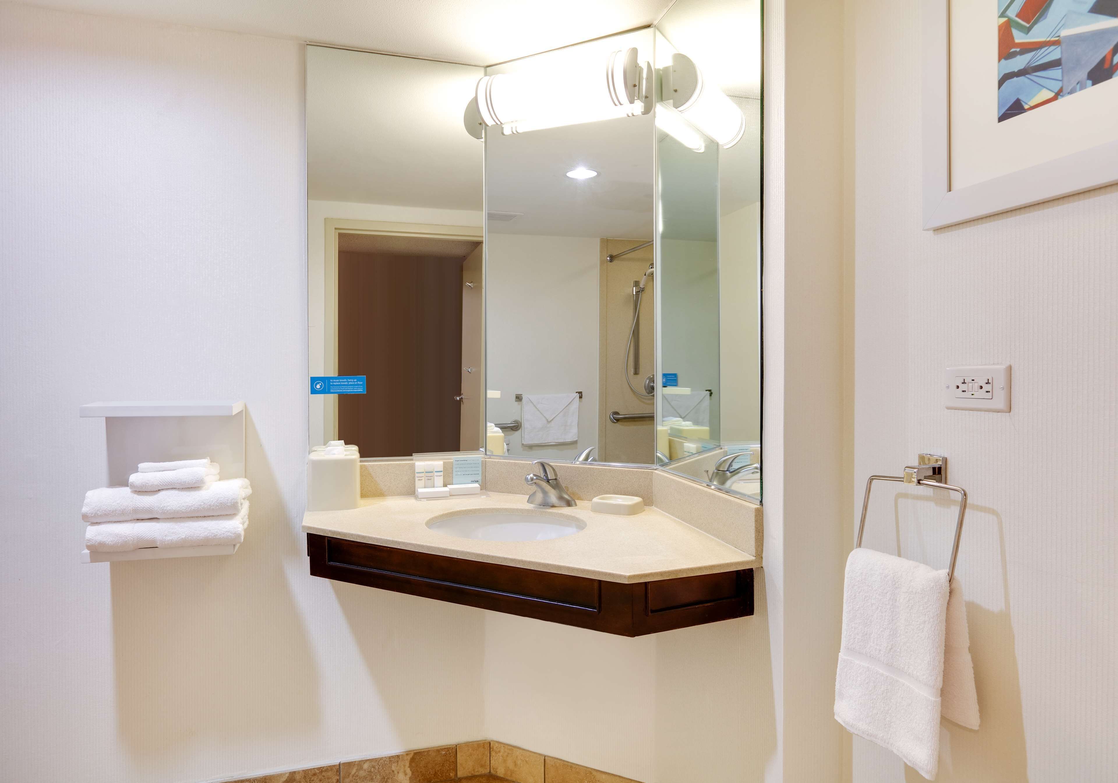 shower, eco-friendly toiletries, hair dryer, towels