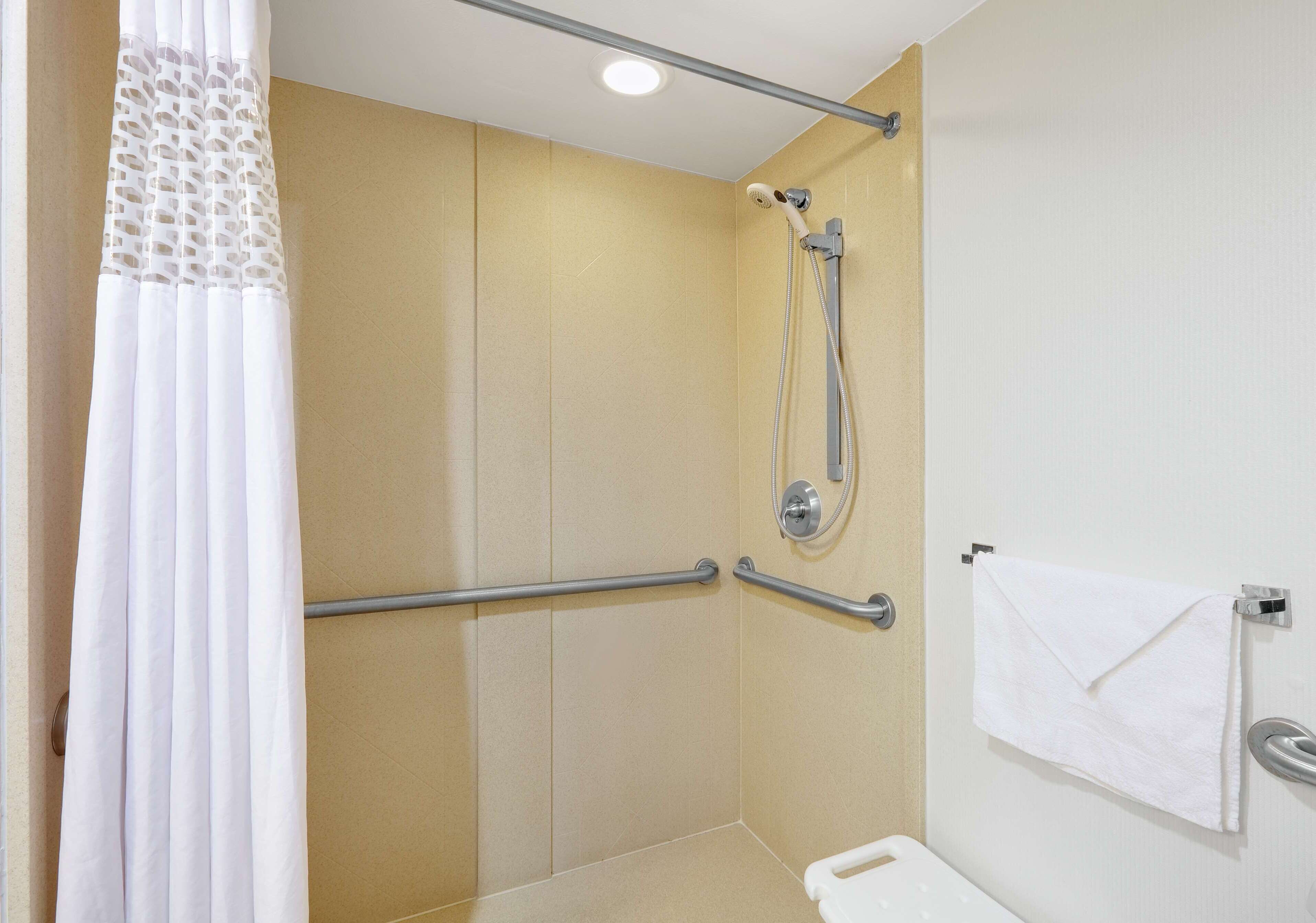 shower, eco-friendly toiletries, hair dryer, towels