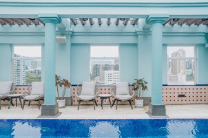 Outdoor pool, open 9:30 AM to 7:30 PM, pool loungers, lifeguards on site