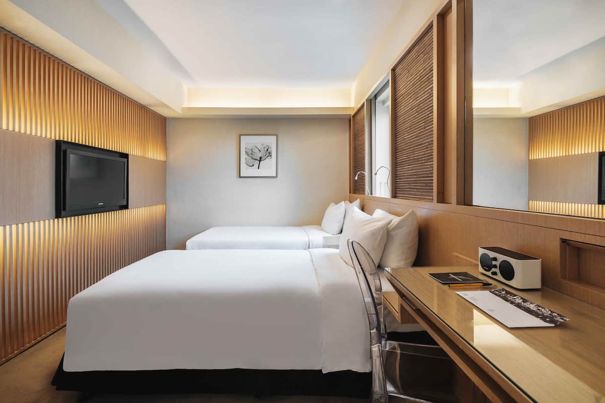 Cabin Twin Beds | City view