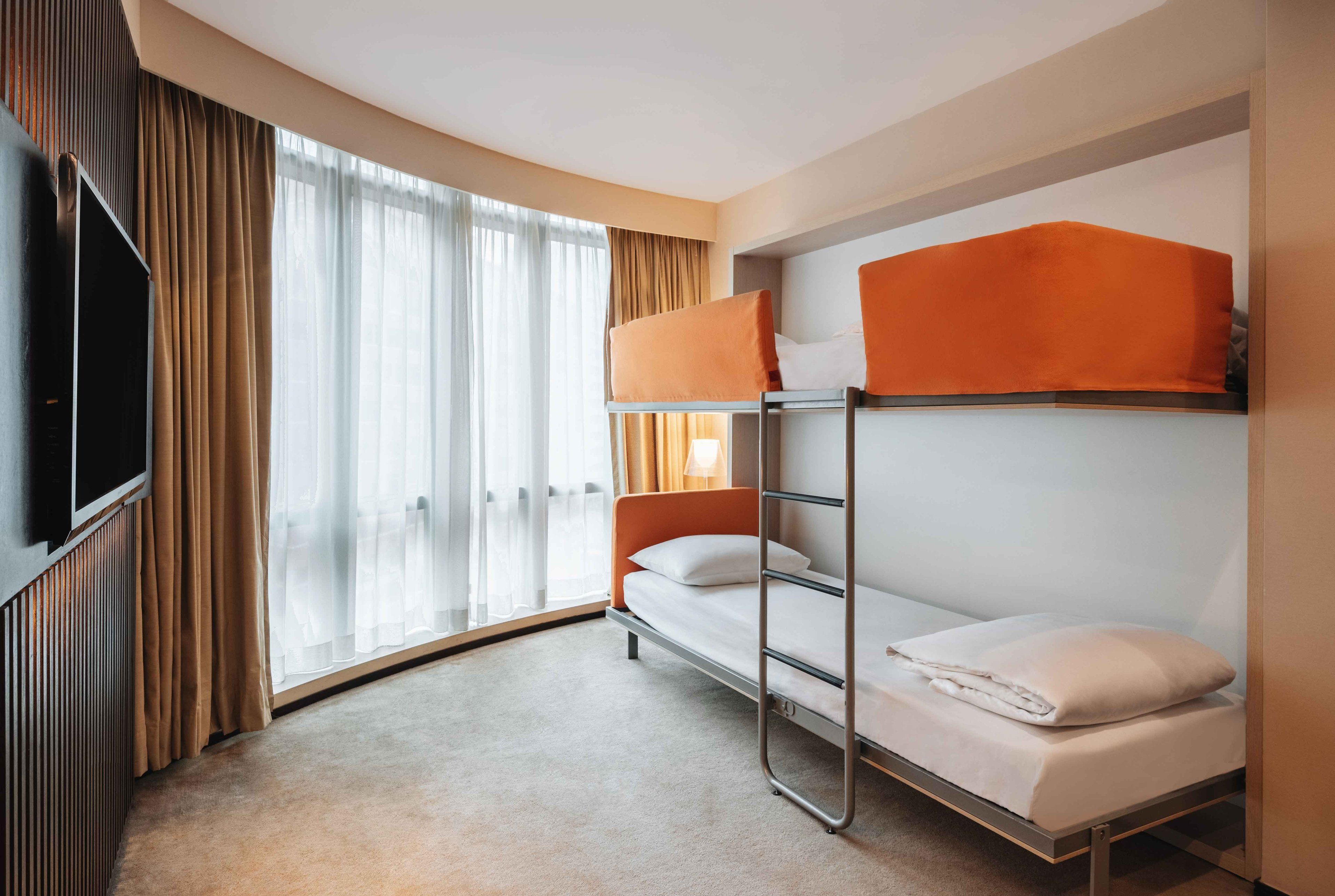 Family Room | In-room safe, desk, blackout drapes, iron/ironing board