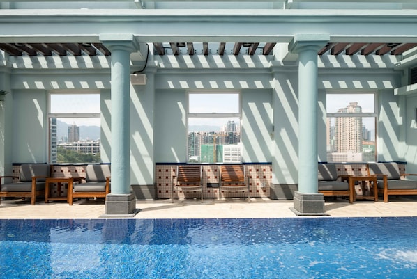 Outdoor pool, open 9:30 AM to 7:30 PM, pool umbrellas, pool loungers