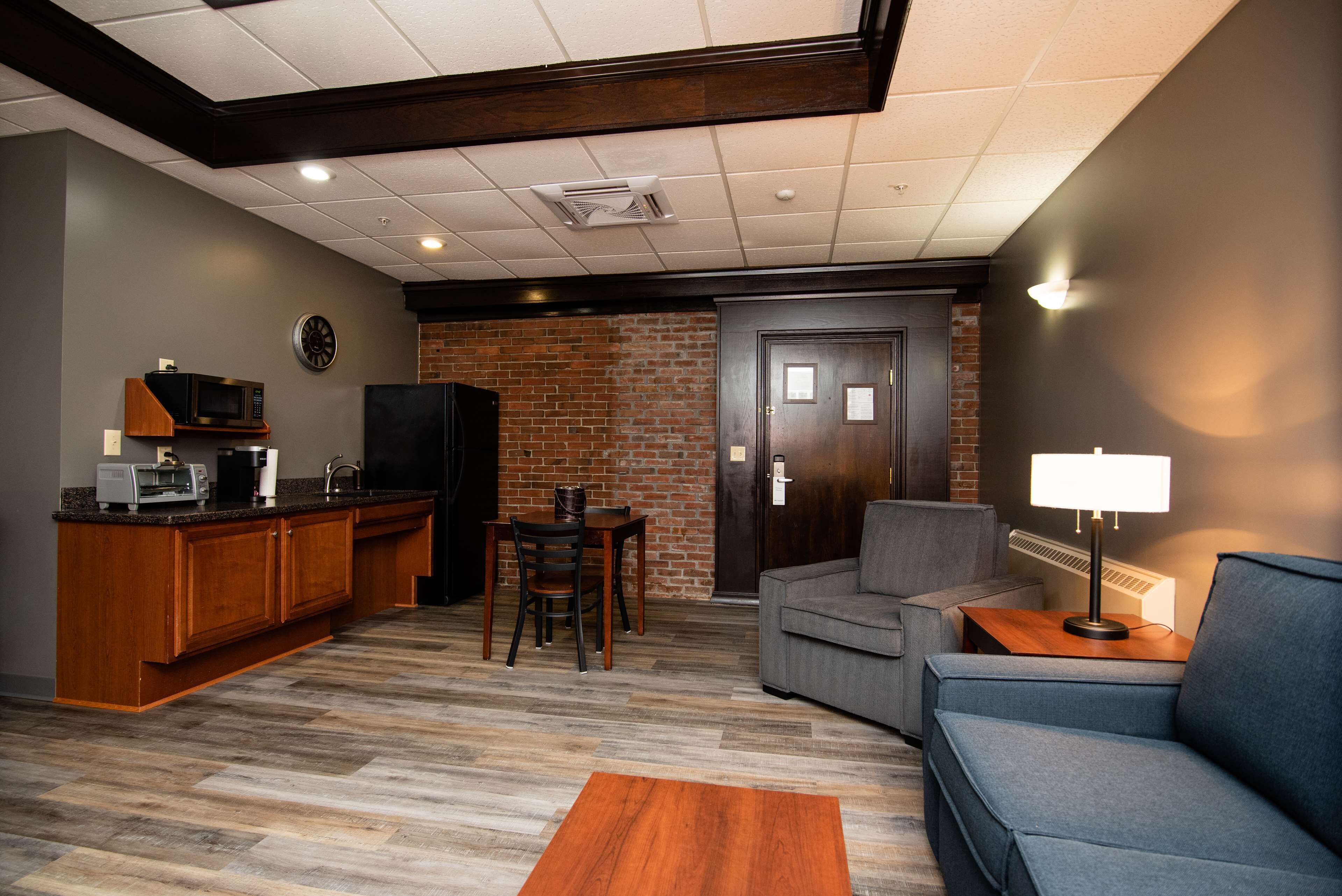 suite, 1 king bed, accessible, jetted tub (walk-in shower;with sofabed) | private kitchenette | fridge, microwave, coffee/tea maker, high chair