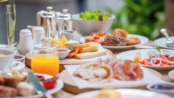 Daily buffet breakfast (EUR 22 per person)