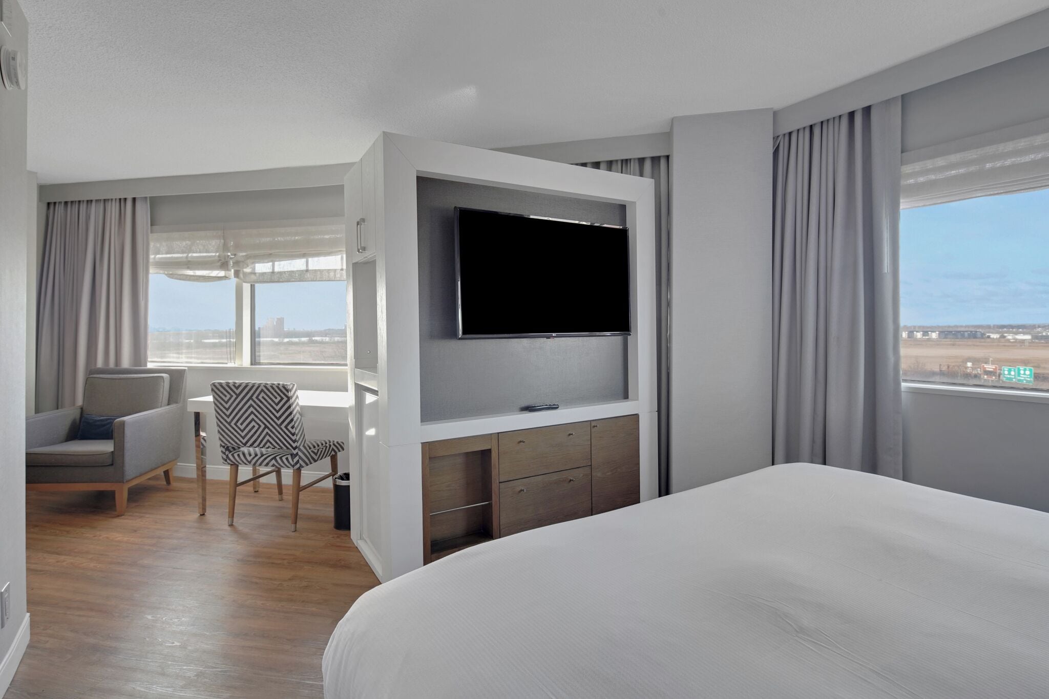 Premium bedding, down comforters, in-room safe, desk