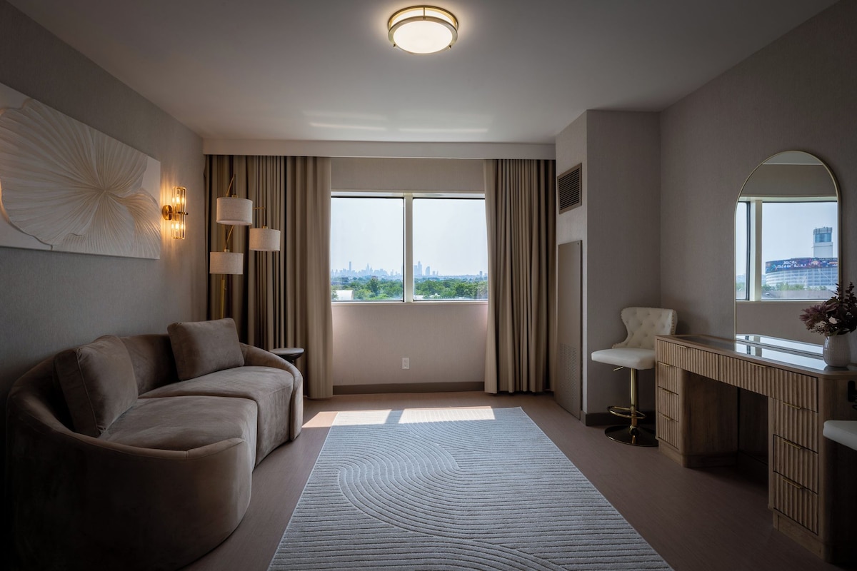 Suite, Roll-in Shower, Non Smoking | Living area | 55-inch LCD TV with digital channels, TV, pay movies