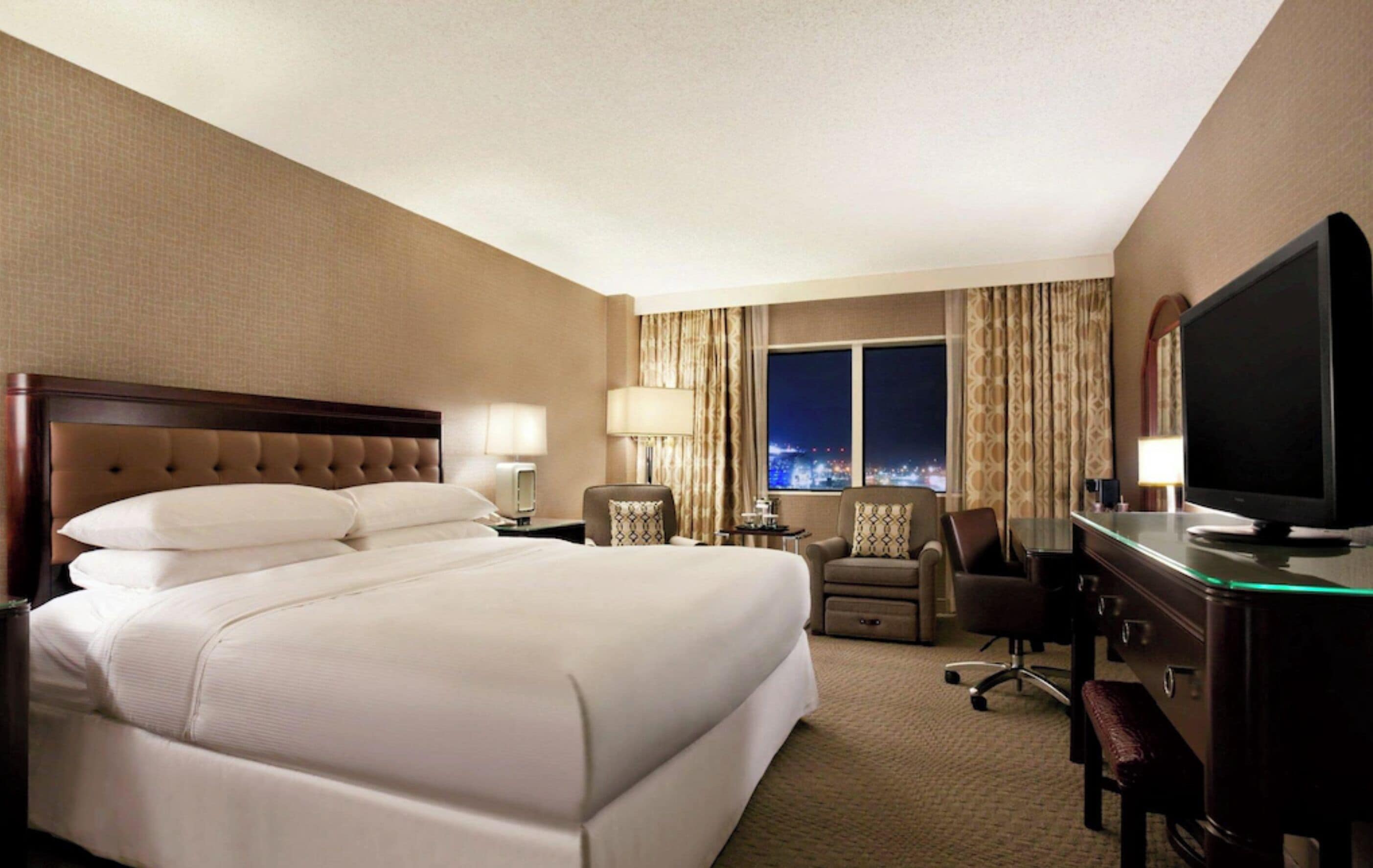 Premium bedding, down comforters, in-room safe, desk