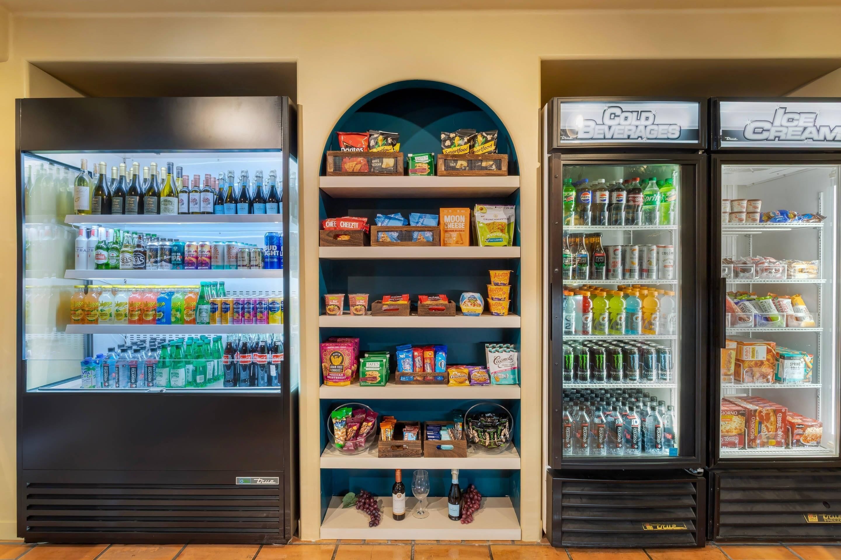 A vending machine area with various beverage and snack options.