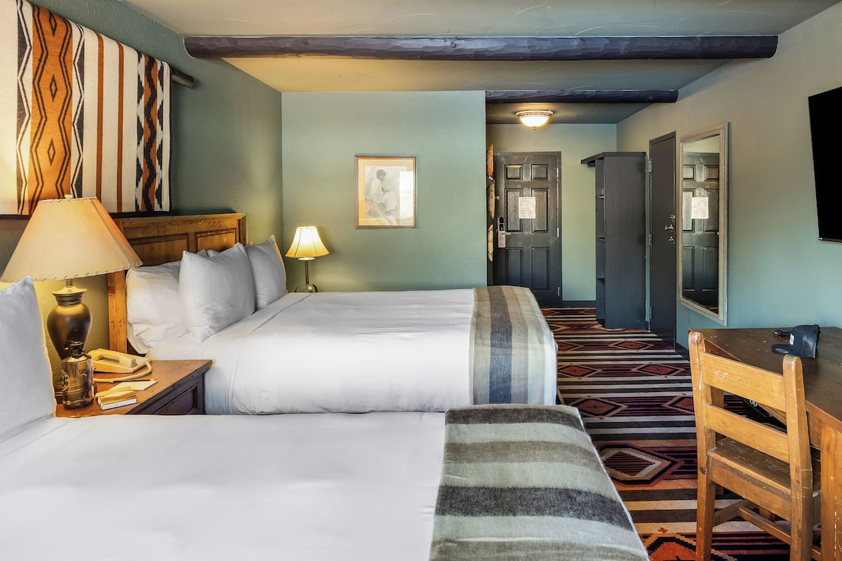 Standard Room, 2 Queen Beds (Nuevo Double Queen Room) | Desk, laptop workspace, iron/ironing board, free internet