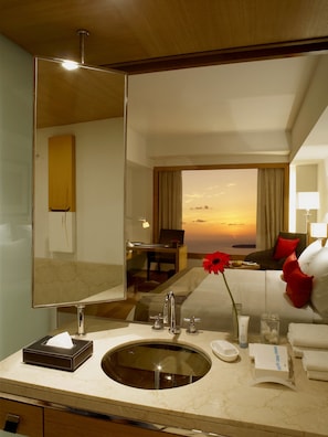 Premier Room, Ocean View | Bathroom | Shower, rainfall showerhead, eco-friendly toiletries, hair dryer