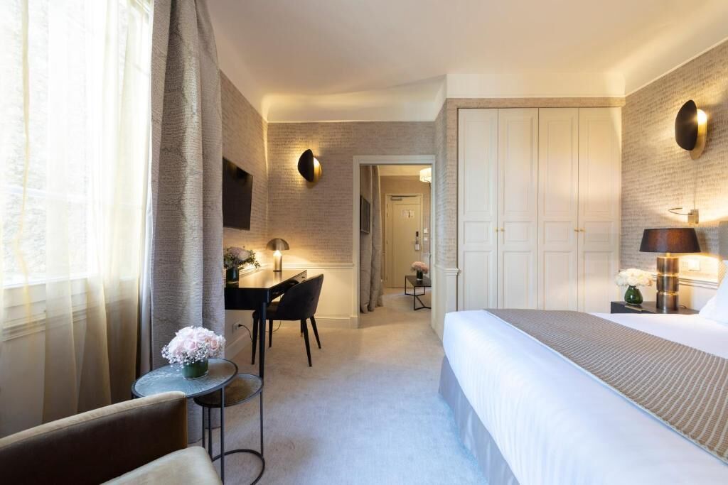 deluxe suite | premium bedding, minibar, in-room safe, individually decorated