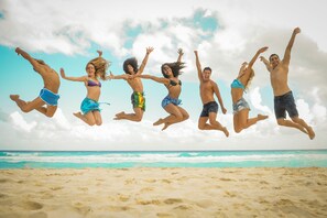 On the beach, white sand, free beach cabanas, sun loungers