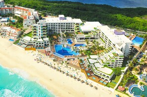 On the beach, white sand, free beach cabanas, sun loungers