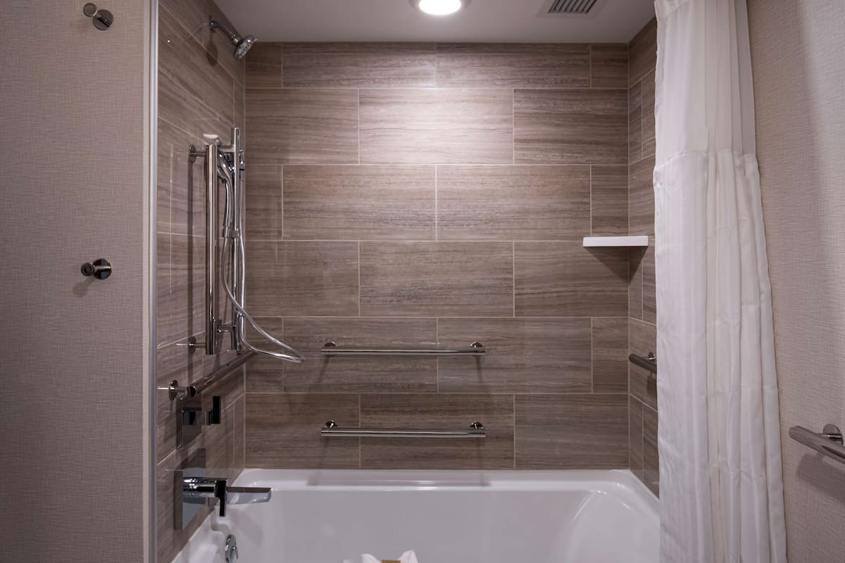 eco-friendly toiletries, hair dryer, towels, soap