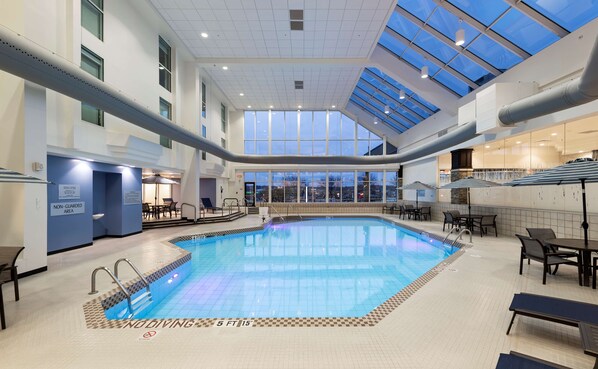 Indoor pool, open 6:00 AM to 10:00 PM, pool loungers
