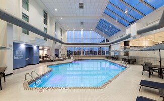 Indoor pool, open 6:00 AM to 10:00 PM, sun loungers