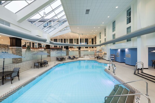 Indoor pool, open 6:00 AM to 10:00 PM, pool loungers
