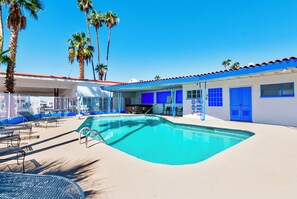 Outdoor pool, open 7:00 AM to 10:00 PM, pool umbrellas - Historic Coronado Motor Hotel by OYO (Yuma)