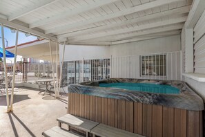 Outdoor pool, open 7:00 AM to 10:00 PM, pool umbrellas