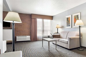 Suite, 1 King Bed, Non Smoking, Refrigerator & Microwave (with Sofabed) | Premium bedding, desk, laptop workspace, blackout drapes
