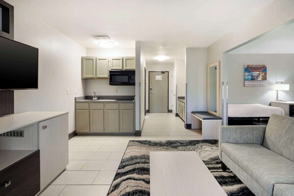 Suite, 1 King Bed, Non Smoking, Refrigerator & Microwave | Individually decorated, individually furnished, desk, laptop workspace