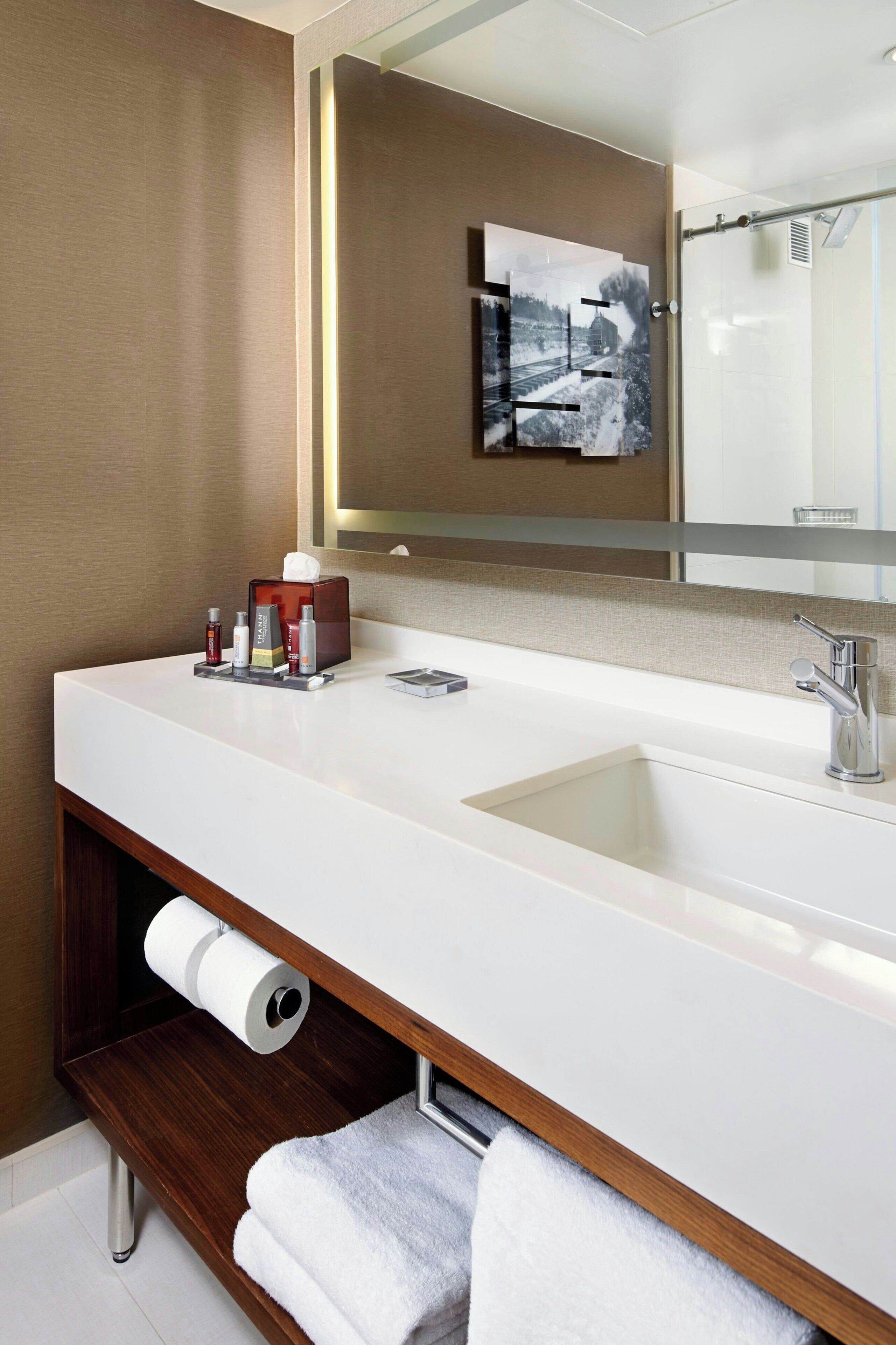 shower, eco-friendly toiletries, hair dryer, towels