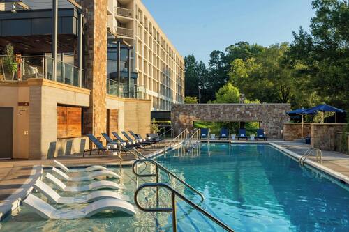 Outdoor pool, open 7 AM to 9 PM, pool umbrellas, sun loungers
