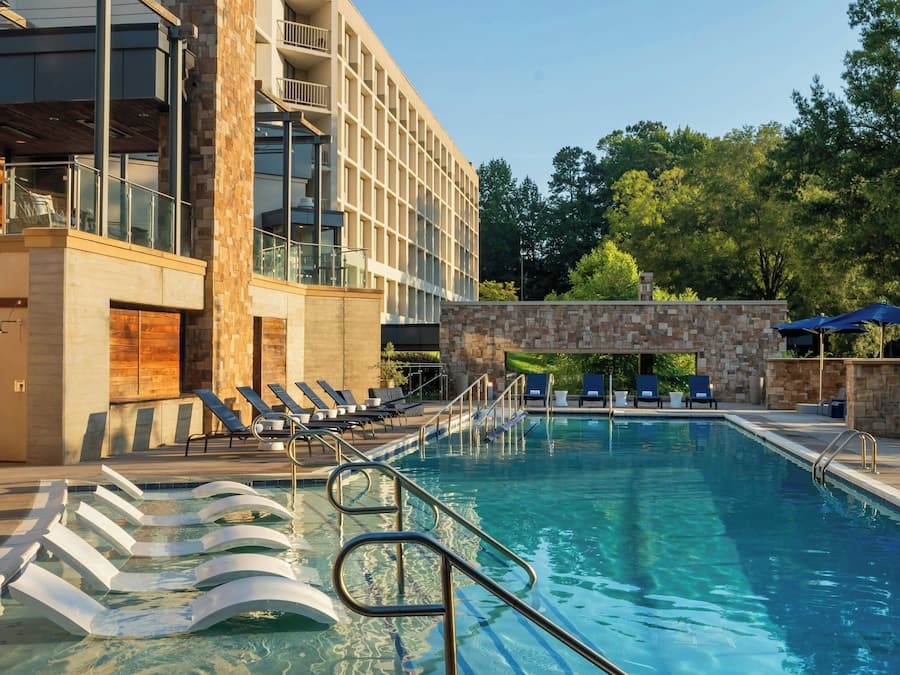 Outdoor pool, open 7 AM to 9 PM, pool umbrellas, sun loungers