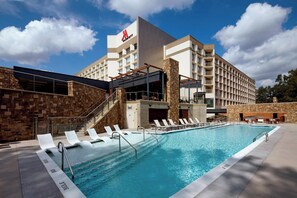 Outdoor pool, open 7 AM to 9 PM, pool umbrellas, sun loungers