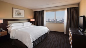 Down duvets, pillow-top beds, in-room safe, desk