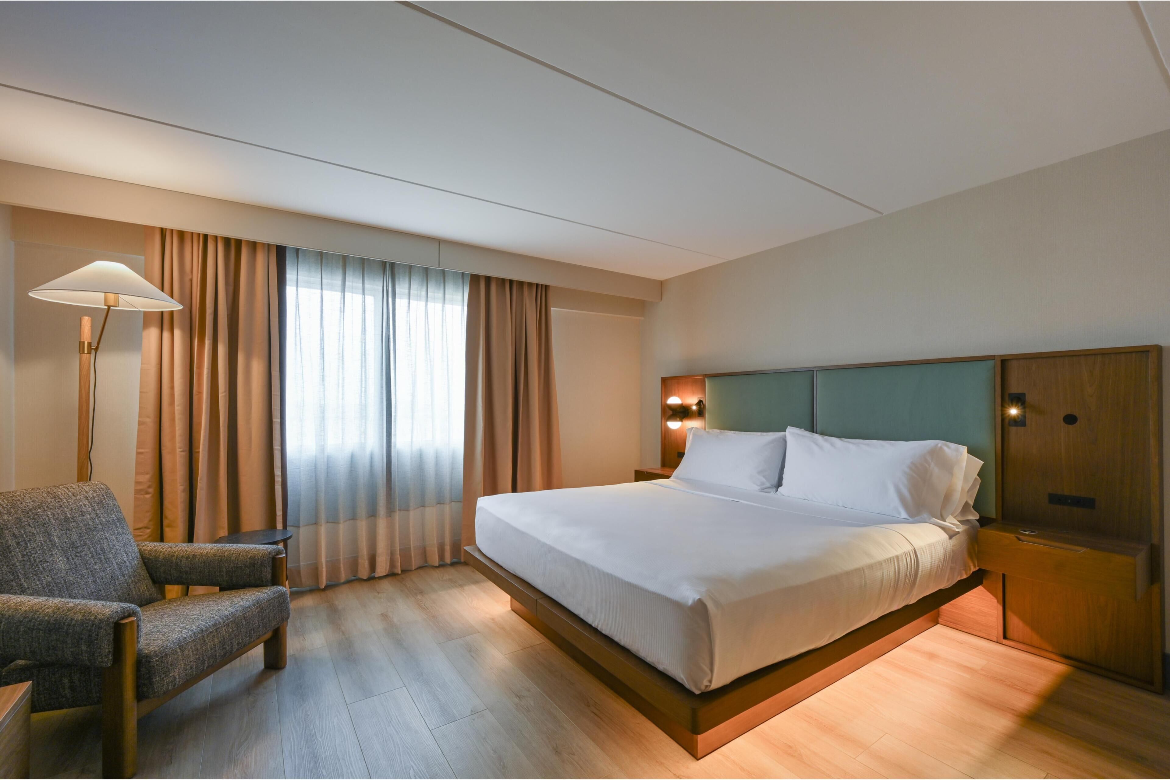Down comforters, pillowtop beds, in-room safe, desk