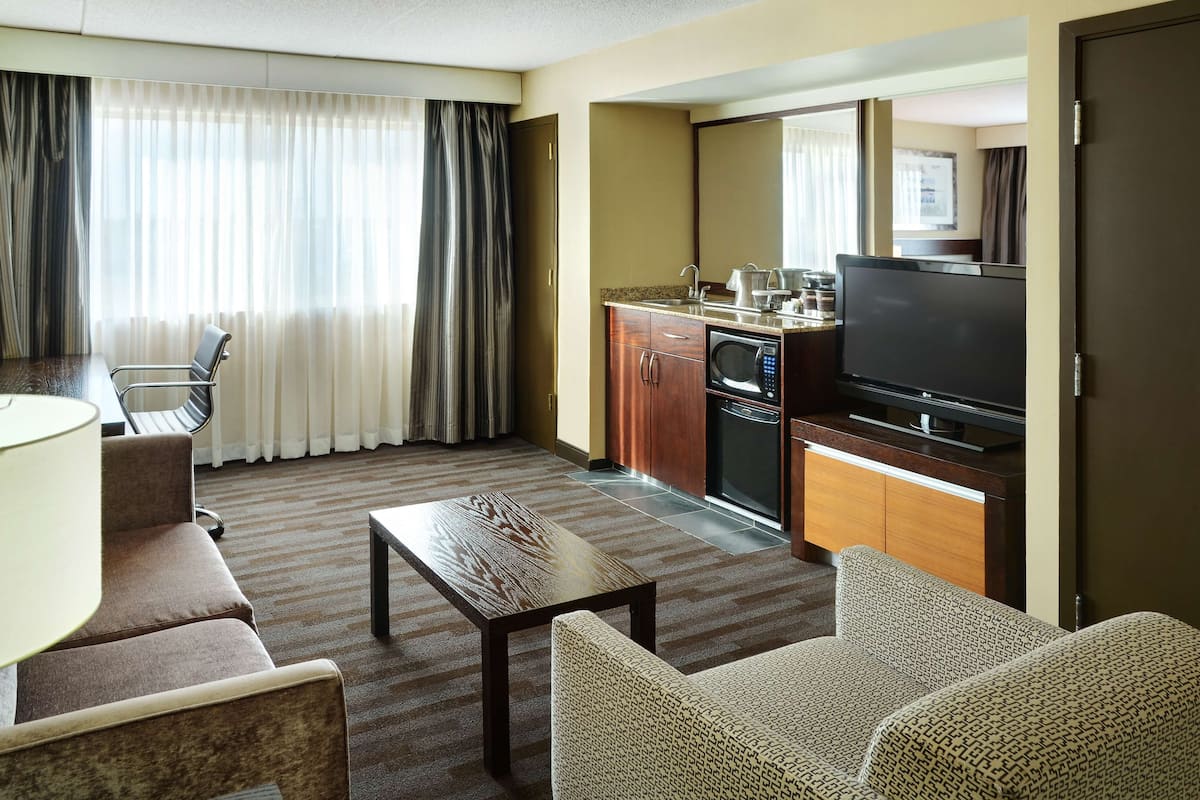 Down comforters, pillowtop beds, in-room safe, desk