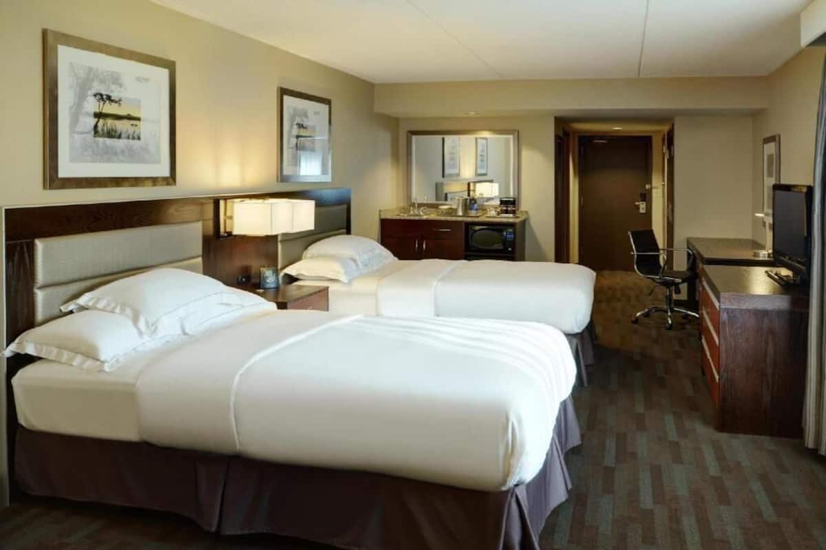 Down comforters, pillowtop beds, in-room safe, desk