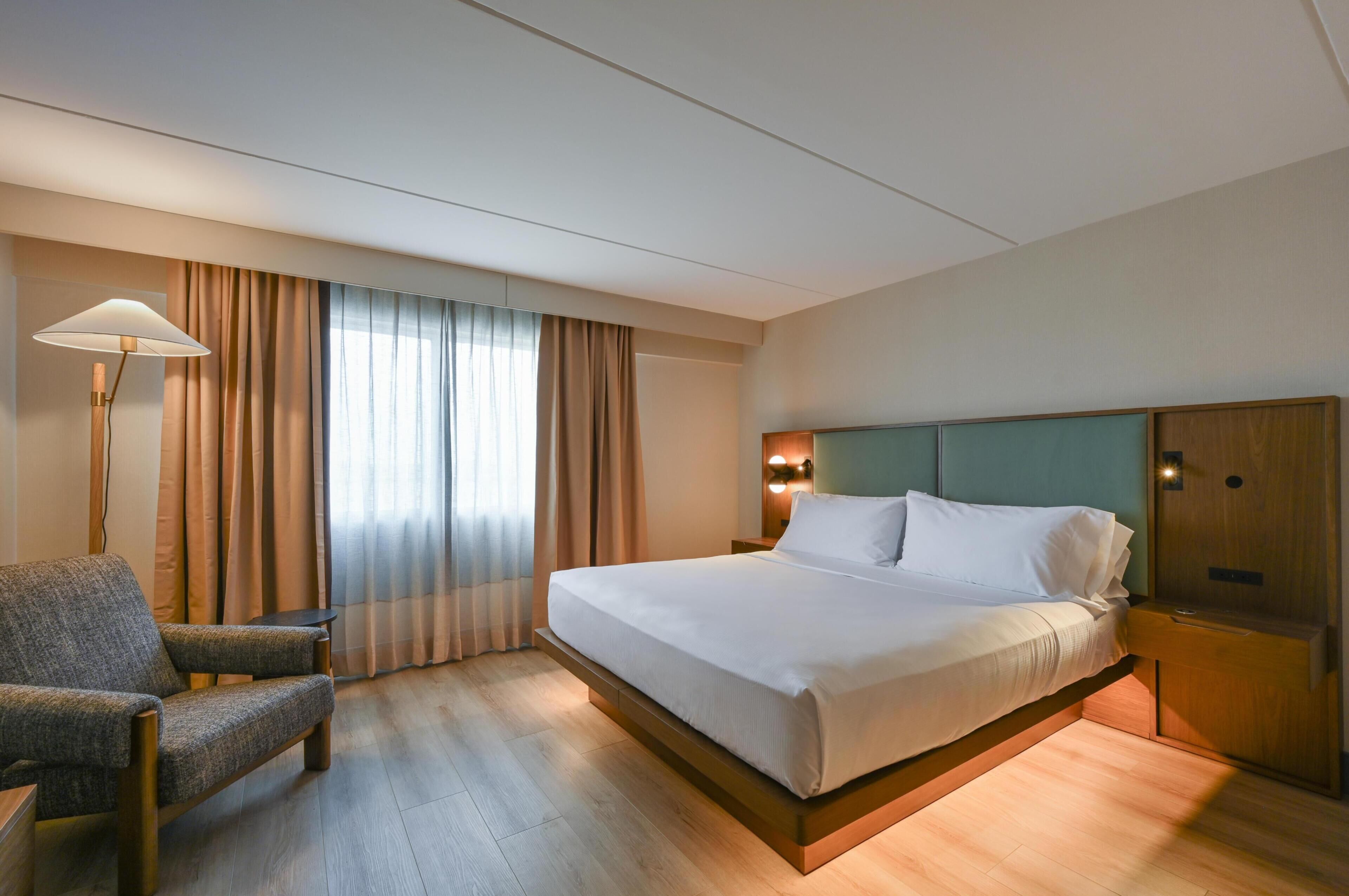 Down comforters, pillowtop beds, in-room safe, desk