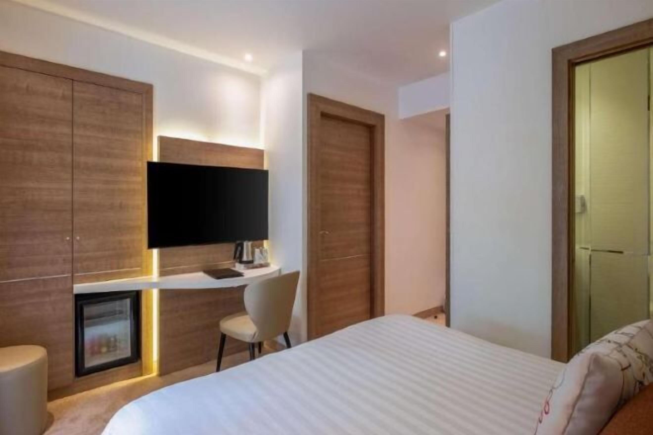 Ropa de cama de alta calidad y minibar 