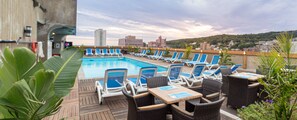 Seasonal outdoor pool, open 8:00 AM to 8:00 PM, sun loungers