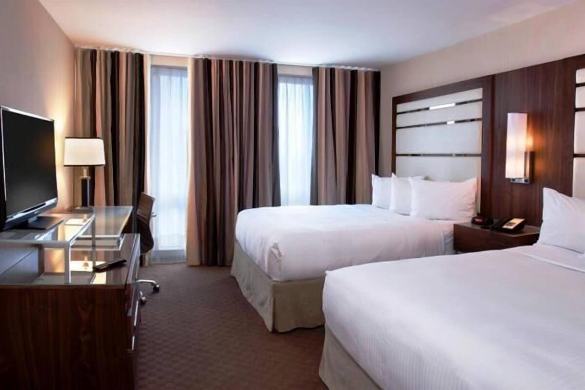 Premium bedding, pillow-top beds, in-room safe, desk