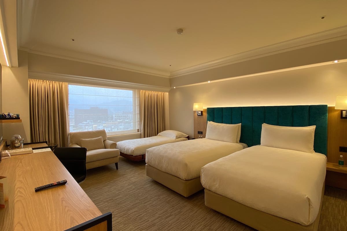 premier deluxe triple room | in-room safe, desk, blackout curtains, soundproofing