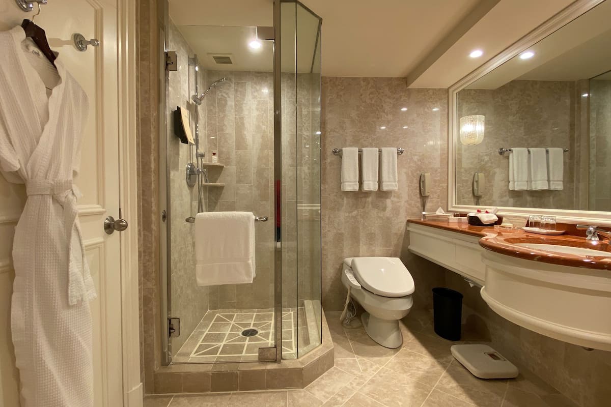 premier deluxe triple room | bathroom | separate bathtub and shower, deep-soaking bathtub, rainfall showerhead