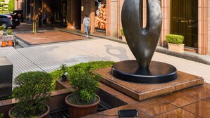 A modern building with a large sculpture in front. - The Sherwood Taipei (Taipei)