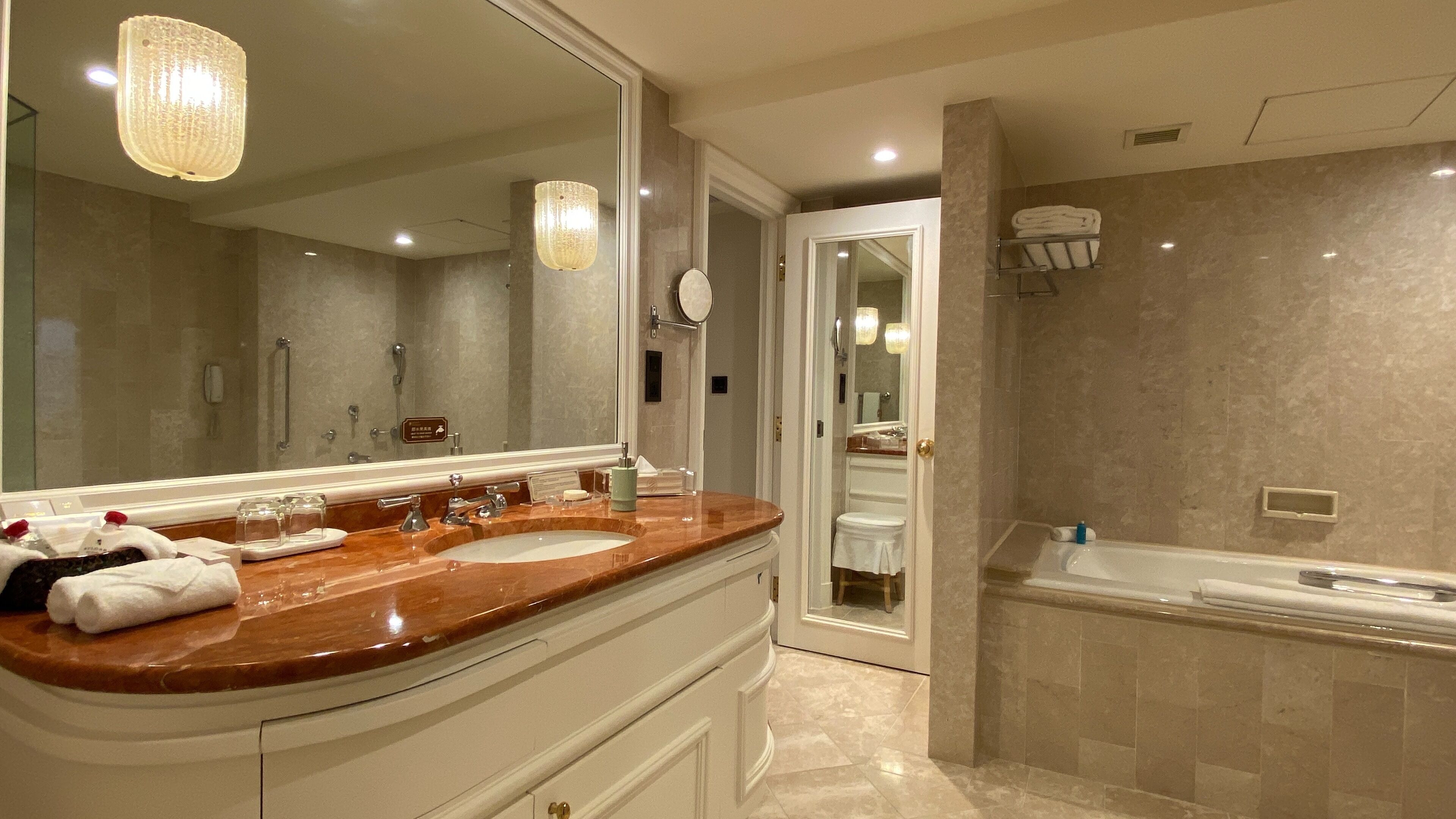 premier deluxe suite | bathroom | separate bathtub and shower, deep-soaking bathtub, rainfall showerhead