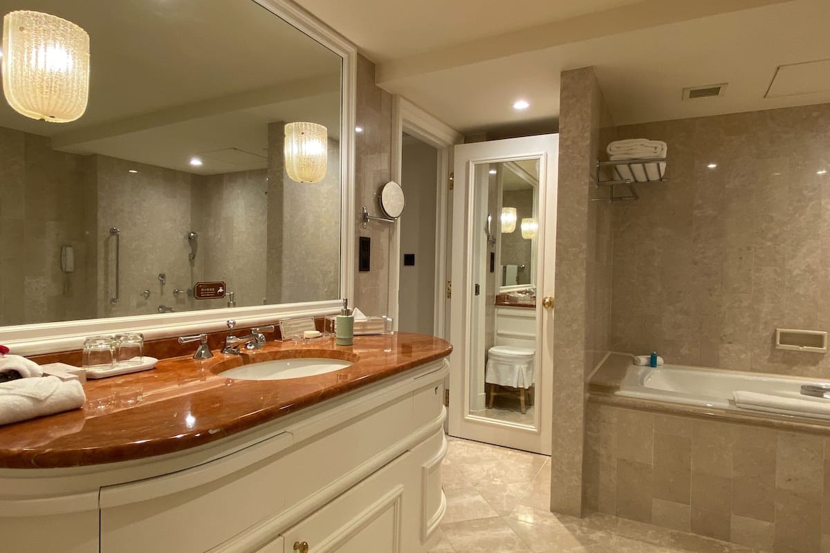 premier deluxe suite | bathroom | separate bathtub and shower, deep-soaking bathtub, rainfall showerhead