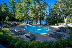 Seasonal outdoor pool, open 9:00 AM to 9:00 PM, pool umbrellas