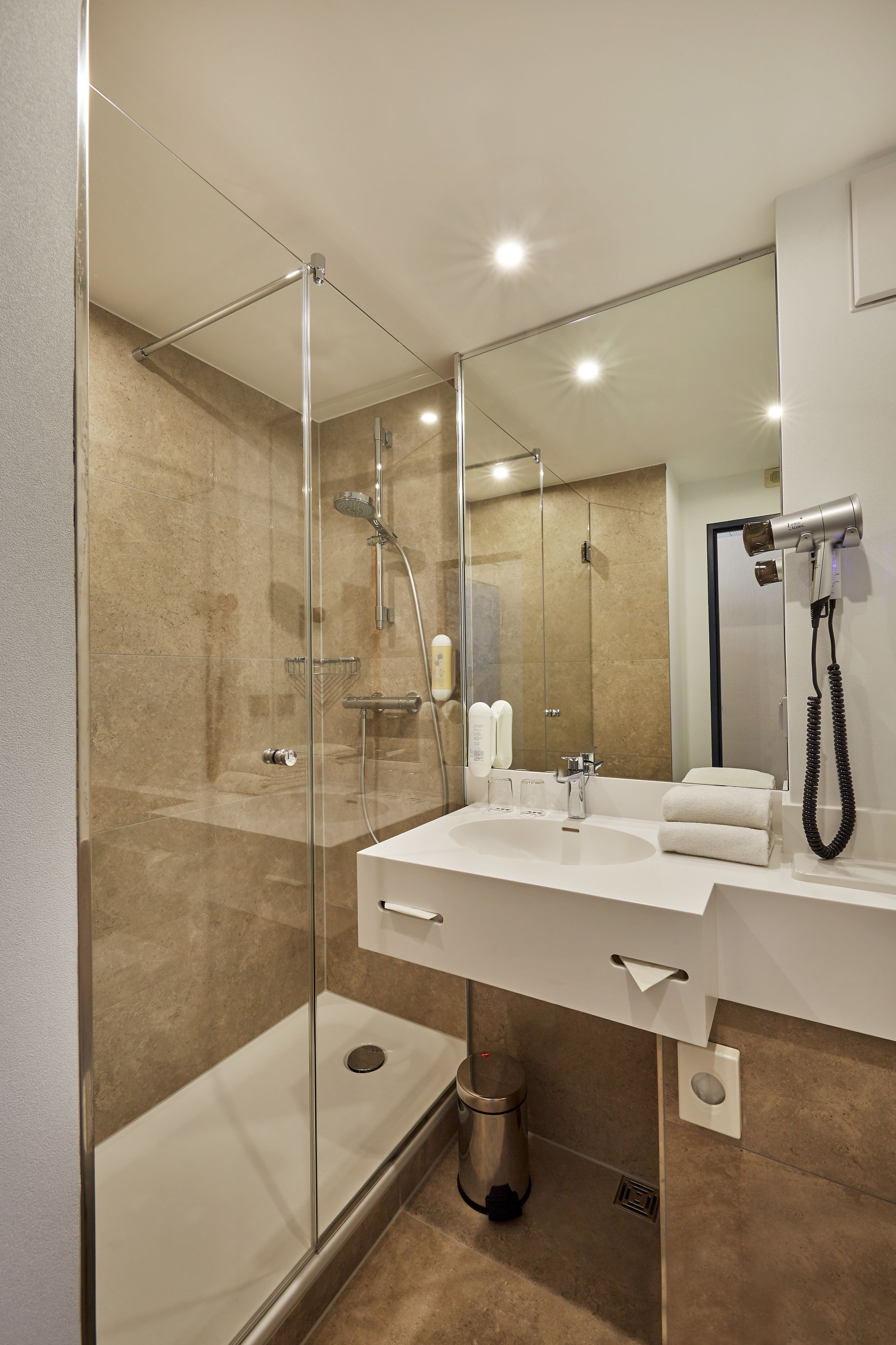 shower, eco-friendly toiletries, hair dryer, towels