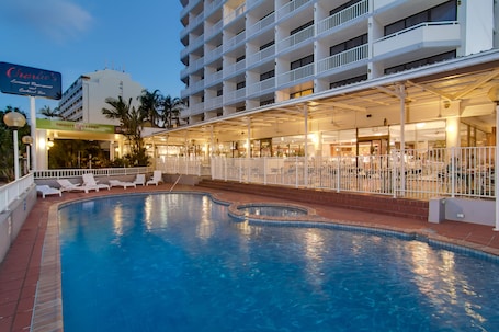 Outdoor pool, sun loungers. Acacia Court Hotel